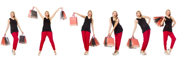 Ensemble de femme avec sacs à provisions sur blanc — Photo