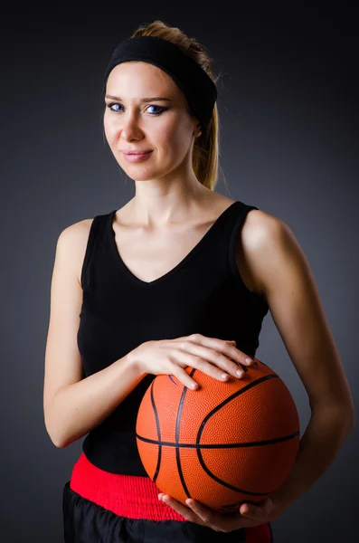 Mulher com basquete no conceito de esporte Imagens Royalty-Free