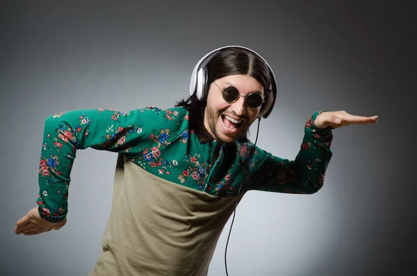 Young man with headphones in DJ concept — Stock Photo, Image