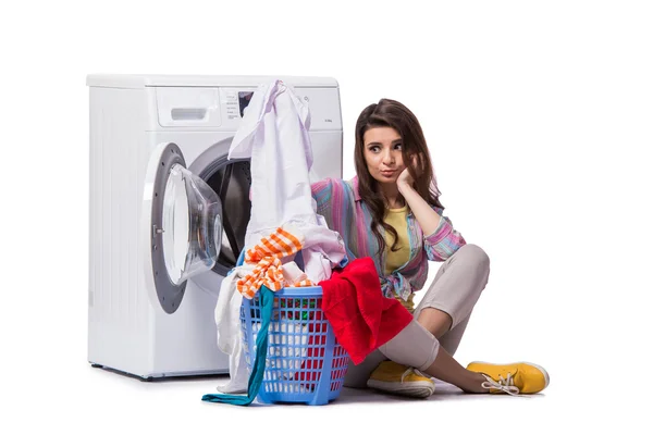 Woman tired after doing laundry isolated on white — Stock Photo, Image