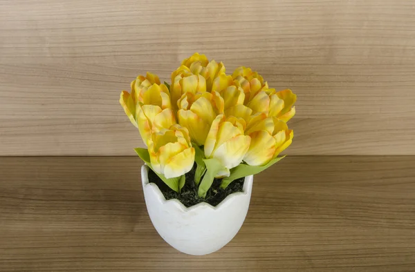 Tulip flowers against wooden background — Stock Photo, Image