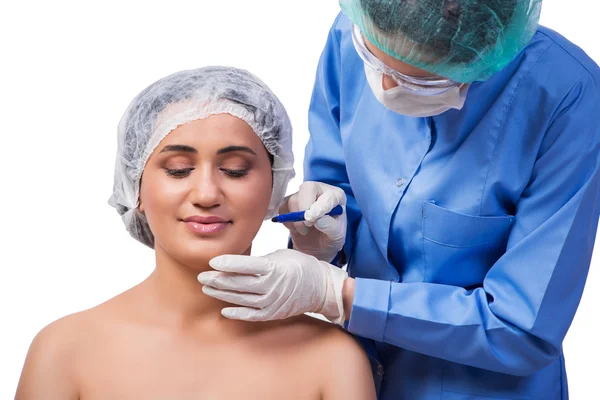 Young woman preparing for plastic surgery isolated on white — Stock Photo, Image