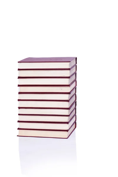 Pilha de livros isolou o fundo branco — Fotografia de Stock