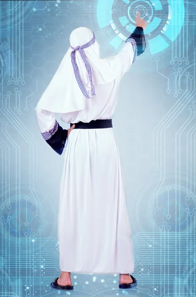 阿拉伯男子按虚拟按钮在未来派概念 — 图库照片