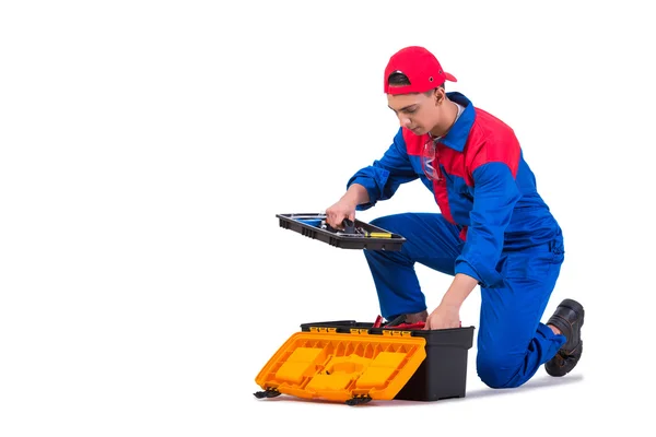 Joven reparador con llave inglesa aislada en blanco — Foto de Stock