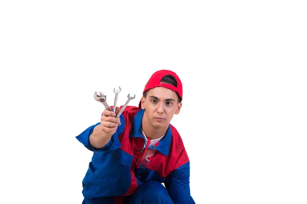 Jonge reparateur met moersleutel moersleutel geïsoleerd op wit — Stockfoto