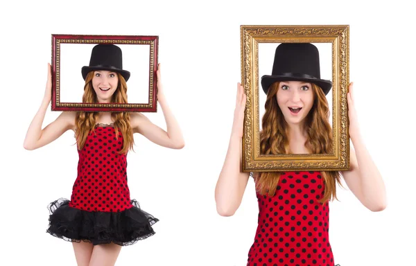 Pretty girl in red polka dot   dress with picture frame  isolate — Stock Photo, Image