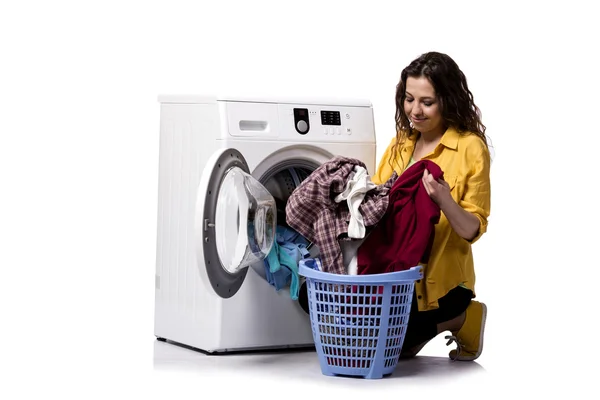 Young woman doing dirty laundry isolated on white — Stock Photo, Image