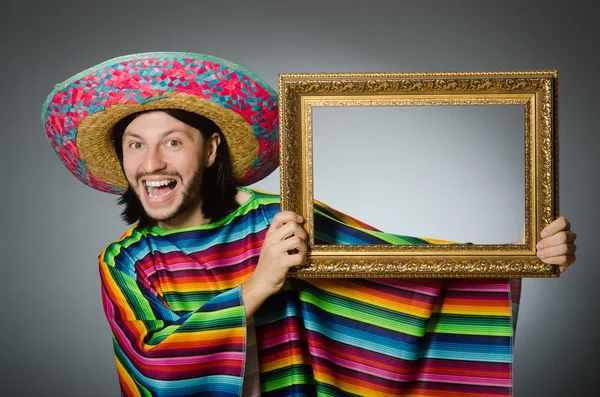 Mexican man with sombrero and picture frame — Stock Photo, Image