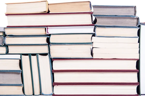 Lotes de livros organizados como fundo — Fotografia de Stock