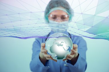 Woman doctor holding earth in globalisation concept clipart