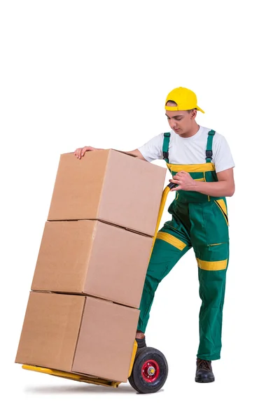 Jovem homem em movimento caixas com carrinho isolado em branco — Fotografia de Stock