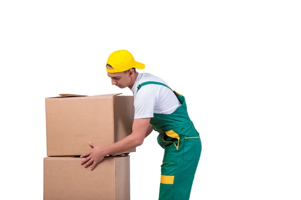 Mladý muž stěhovací krabice s vozíkem izolovaných na bílém — Stock fotografie