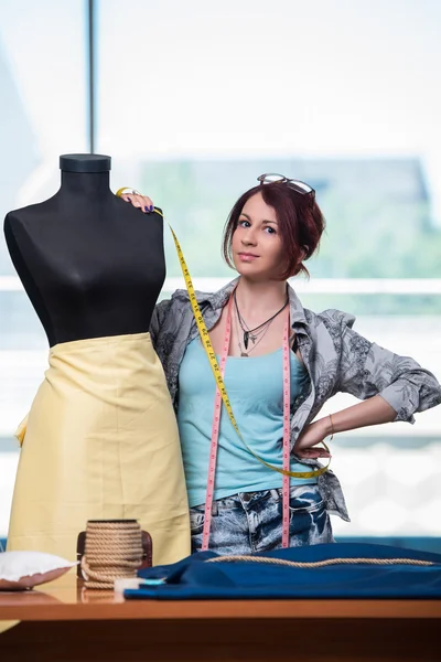 Woman tailor working on new clothing — Stock Photo, Image