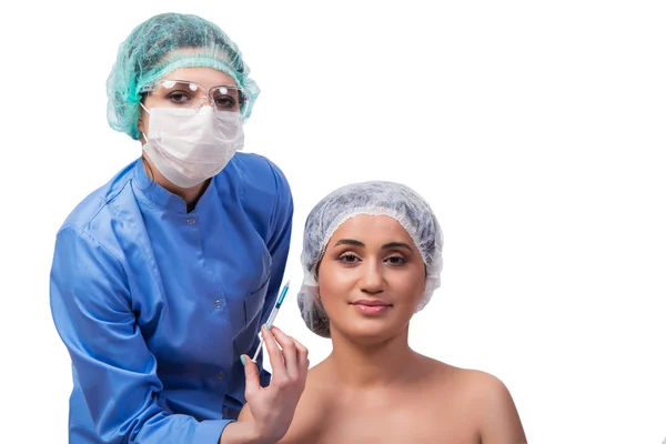 Young woman preparing for plastic surgery isolated on white — Stock Photo, Image