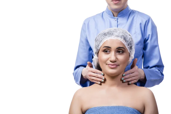 Ung kvinna förbereder för plastikkirurgi isolerad på vit — Stockfoto