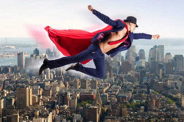 Superman en de stad in concept — Stockfoto