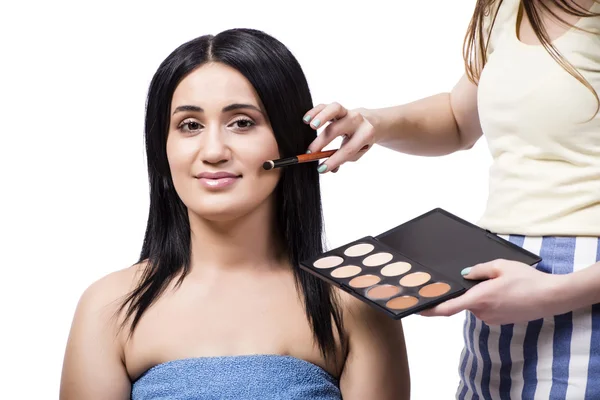 Mladá žena se make-up izolovaných na bílém — Stock fotografie