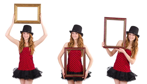 Pretty girl in red polka dot   dress with picture frame  isolate — Stock Photo, Image