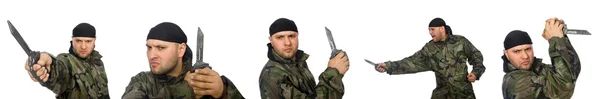 Egy katona egyenruhás fiatalember, fehér késsel a kezében. — Stock Fotó