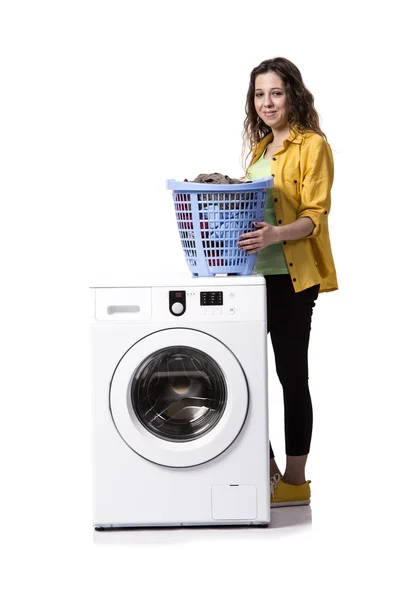 Jovem mulher fazendo sujo lavanderia isolado no branco — Fotografia de Stock