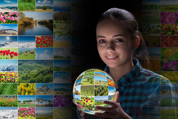 Young woman holding earth with nature photos