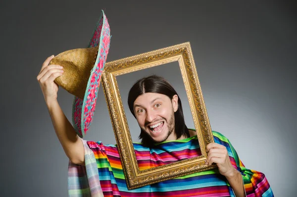 Funny man with sombrero and picture frame — Stock Photo, Image