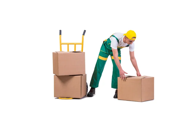 Giovane uomo in movimento scatole con carrello isolato su bianco — Foto Stock