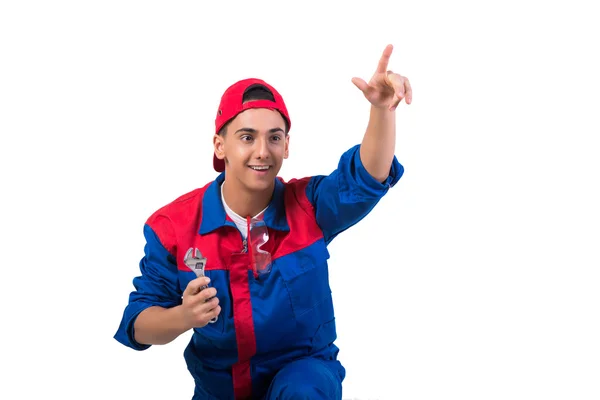 Young repairman with wrench spanner isolated on white — Stock Photo, Image