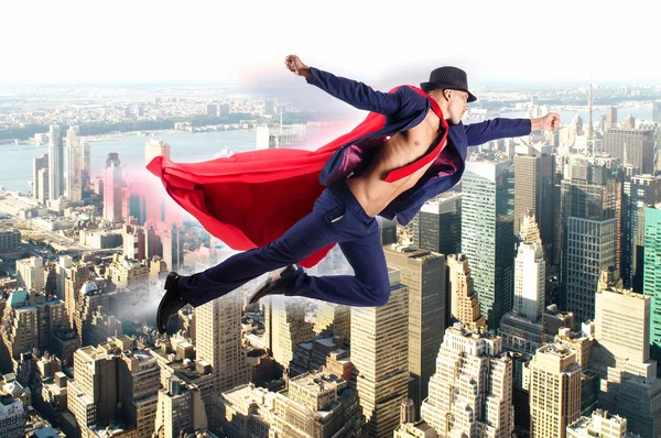 Superman und die Stadt im Konzept — Stockfoto