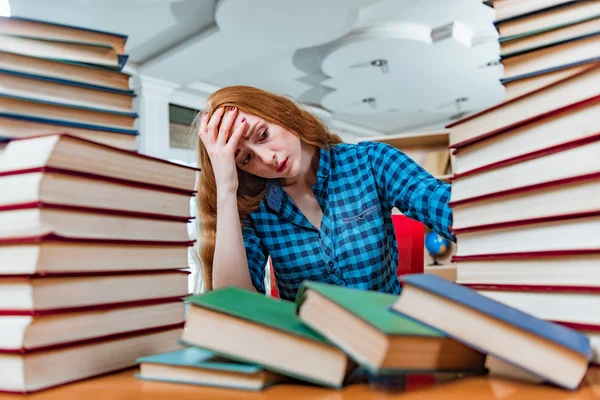 Young female student preparing for exams Royalty Free Stock Images