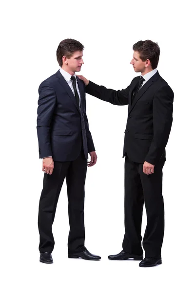 Dois irmãos gêmeos handshaking isolado no branco — Fotografia de Stock