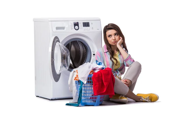 Woman tired after doing laundry isolated on white — Stock Photo, Image