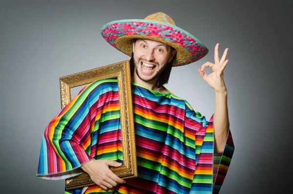 Funny man with sombrero and picture frame — Stock Photo, Image