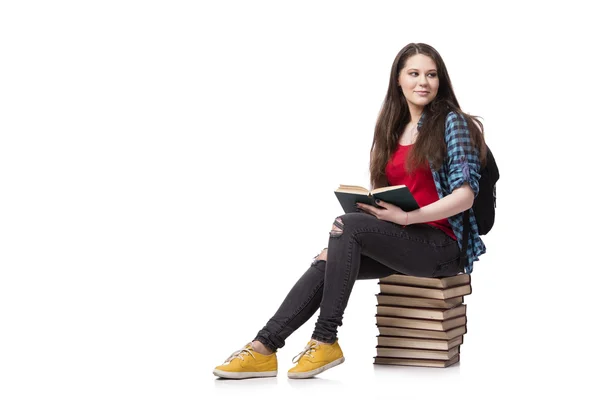 Student mit vielen Büchern isoliert auf dem weißen — Stockfoto