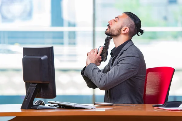 Desperate broke man committing suicide in the office — Stock Photo, Image