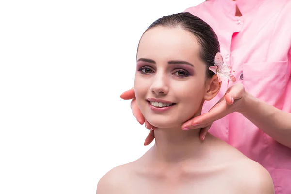 Beautiful young woman during face massage session — Stock Photo, Image