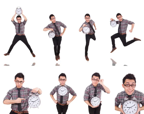 Young man with clock isolated on white — Stock Photo, Image