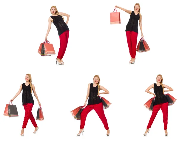 Ensemble de femme avec sacs à provisions sur blanc — Photo