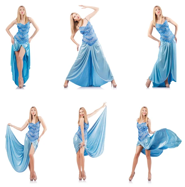 Attraktiv kvinna i blå klänning på vit — Stockfoto