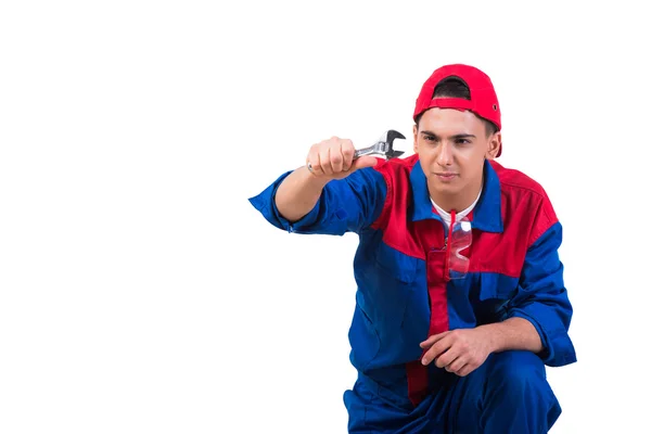 Jonge reparateur met moersleutel moersleutel geïsoleerd op wit — Stockfoto