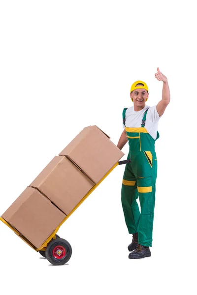 Giovane uomo in movimento scatole con carrello isolato su bianco — Foto Stock