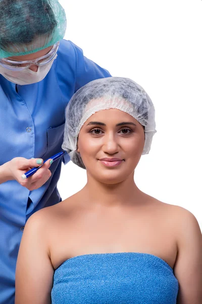 Young woman preparing for plastic surgery isolated on white — Stock Photo, Image