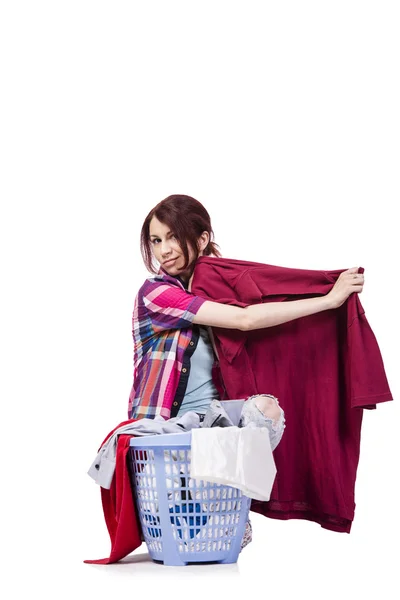 Woman tired after doing laundry isolated on white — Stock Photo, Image