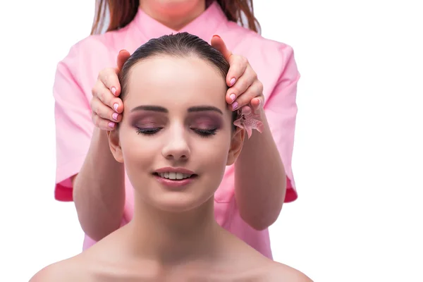 Beautiful young woman during face massage session — Stock Photo, Image