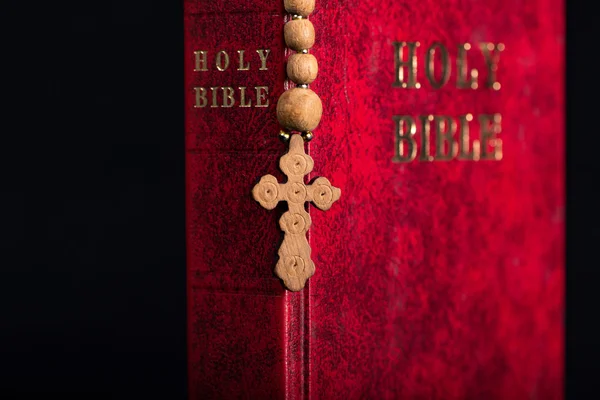 Bible and cross in religious concept — Stock Photo, Image