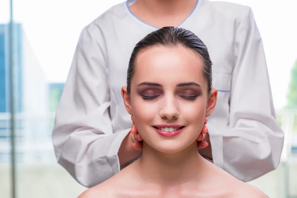 Young woman during face and skin massage session — Stock Photo, Image