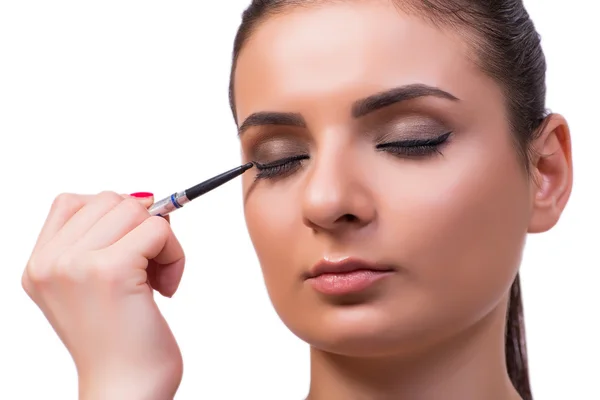 Schöne Frau während der Make-up-Kosmetik-Sitzung — Stockfoto