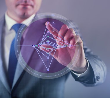 İşadamı grafikte iş kavramı ile çalışma