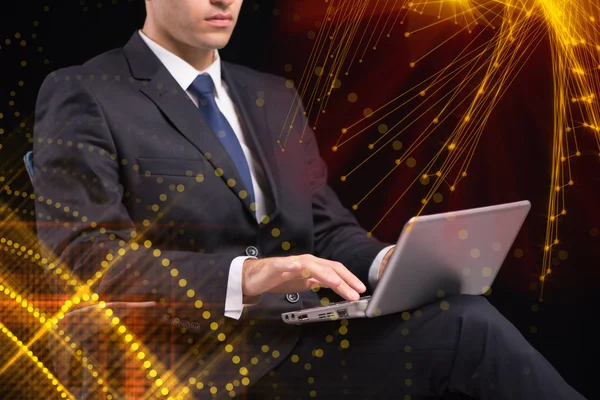 Young businessman with laptop in business concept — Stock Photo, Image